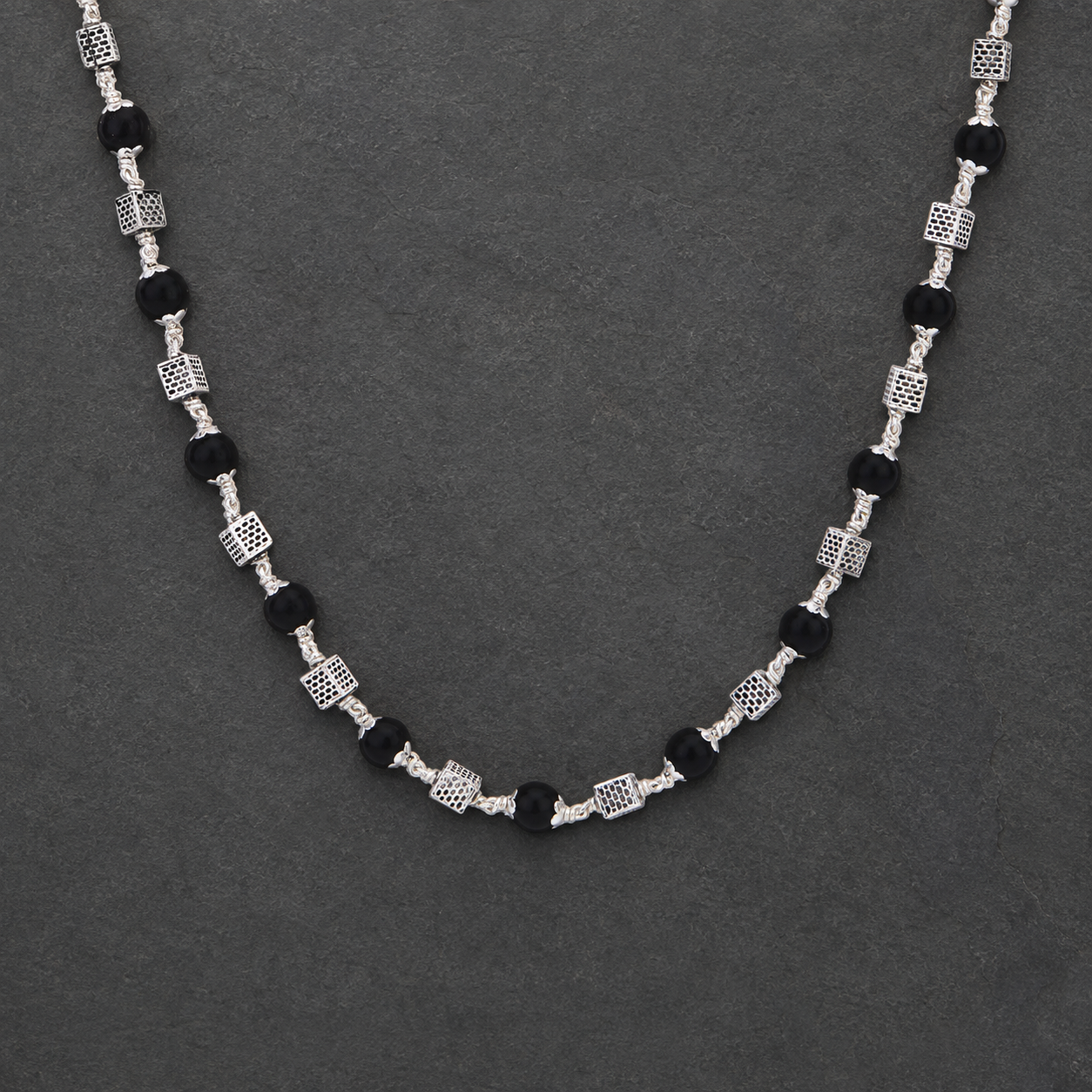925 silver Karungali mala square bead craftsmanship close-up