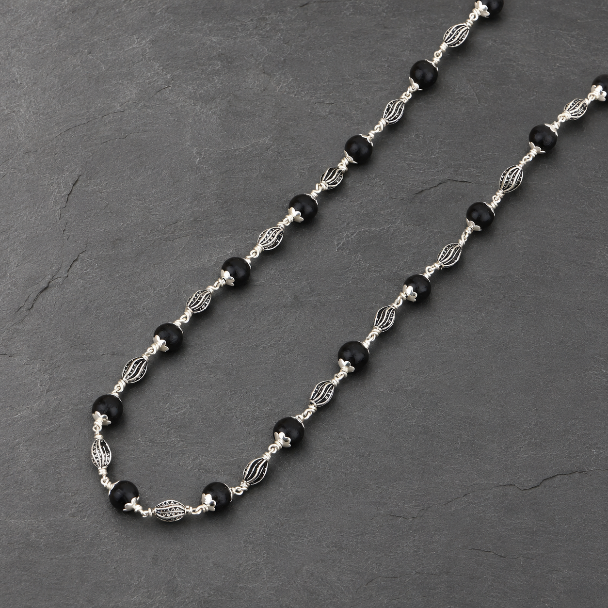 925 silver Karungali mala marquise bead craftsmanship close-up