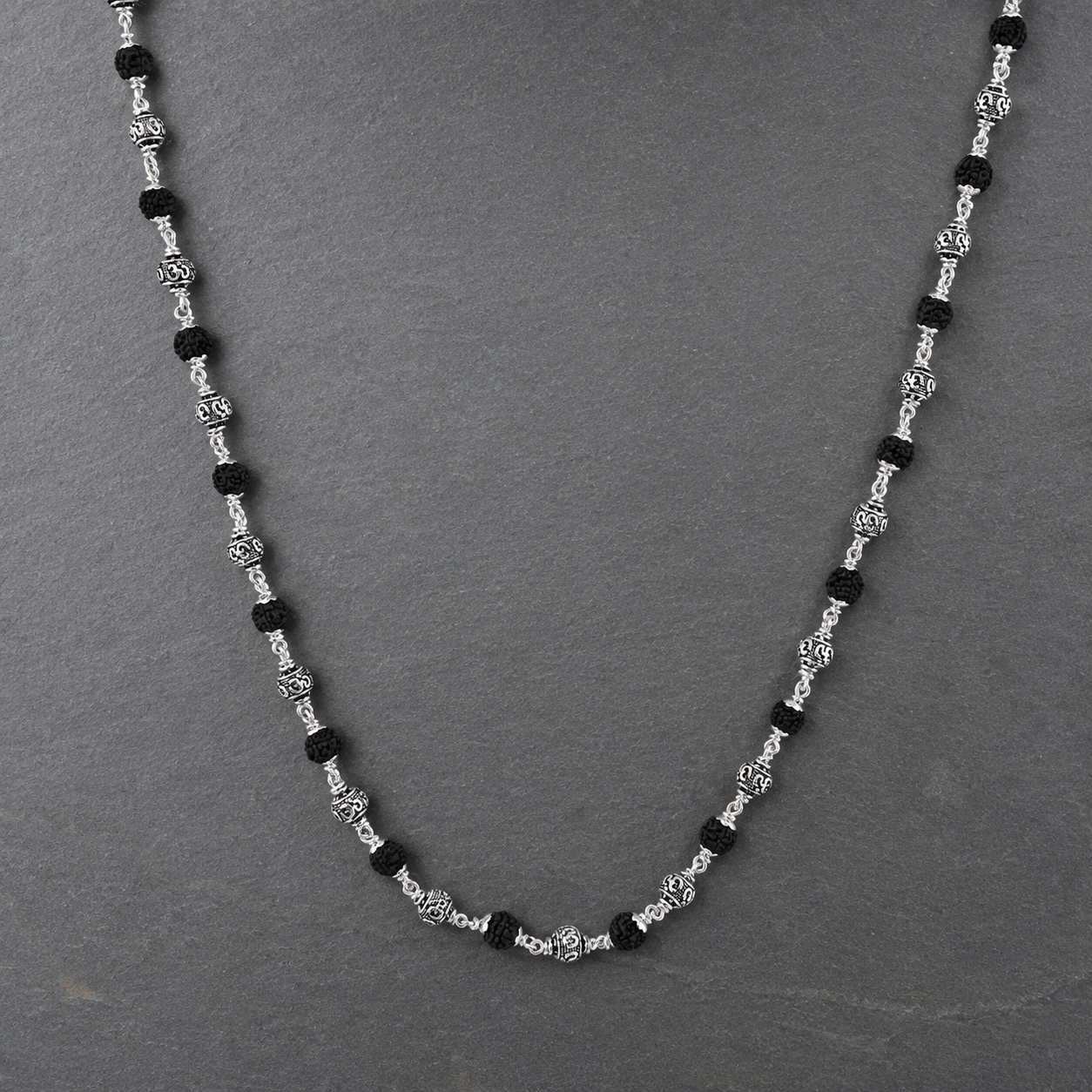 925 silver Om bead purity detail on Rudraksha Mala