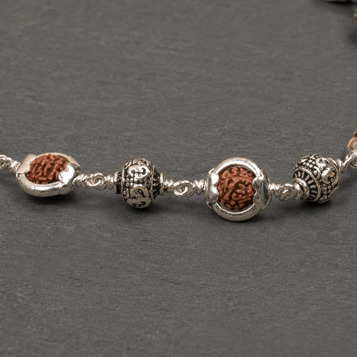 925 silver Om beads and Rudraksha craftsmanship detail