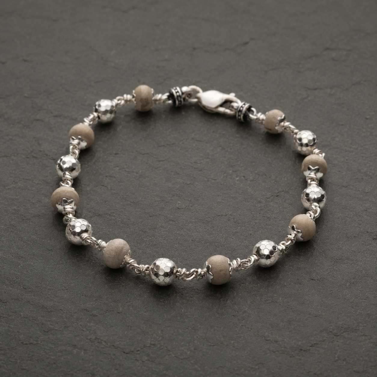 Angled Tulsi bracelet showing twisted 925 silver link craftsmanship