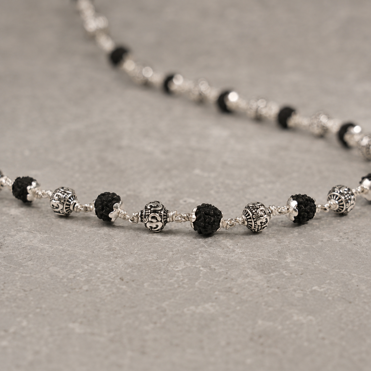 Black Rudraksha Mala with 925 Silver Om Beads for Men