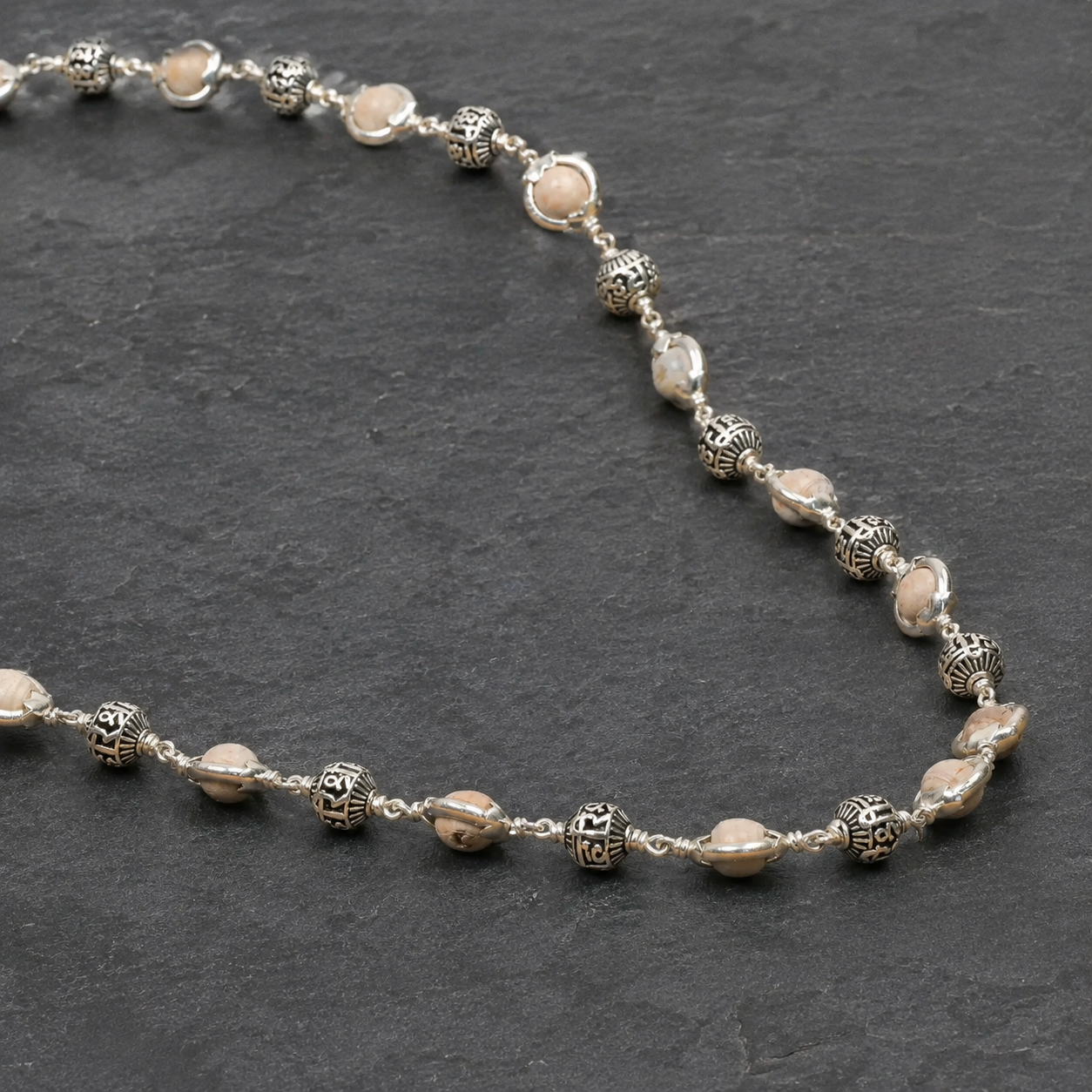 Close-up of Shree Hari silver beads and Tulsi capping