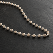 Close-up of Tulsi beads and 925 silver detailing
