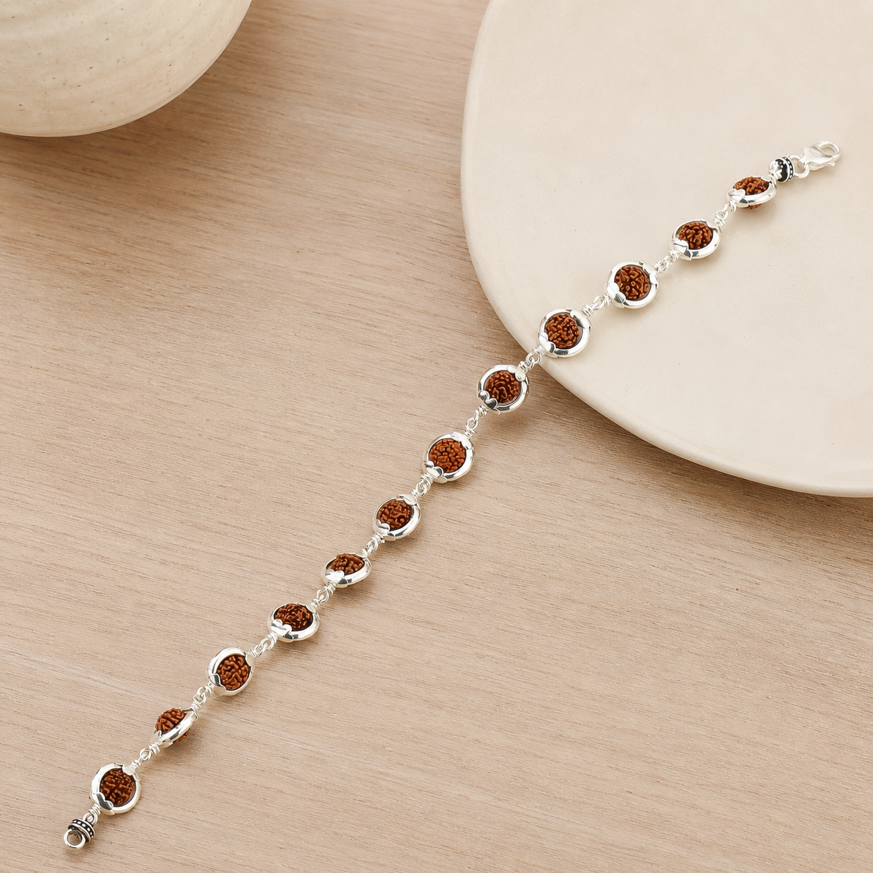 Full view of silver capped Rudraksha bracelet for men and women