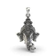 Close-up of oxidized detailing on Lord Ganesha face pendant,