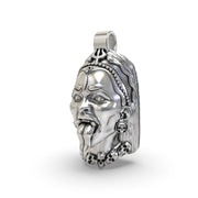 Kali Maa silver pendant displayed on hand