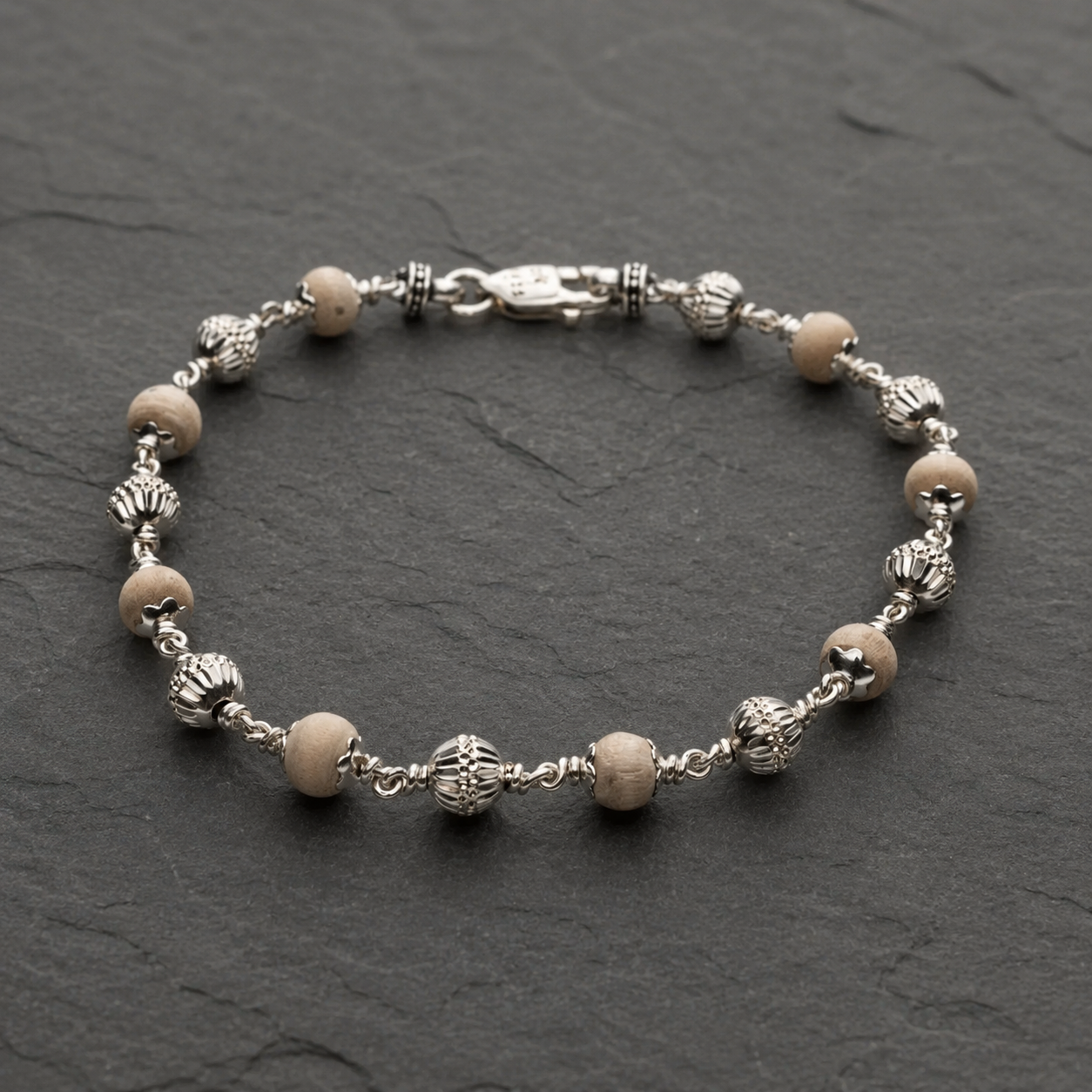 Handcrafted Tulsi bracelet showing 925 silver bead craftsmanship