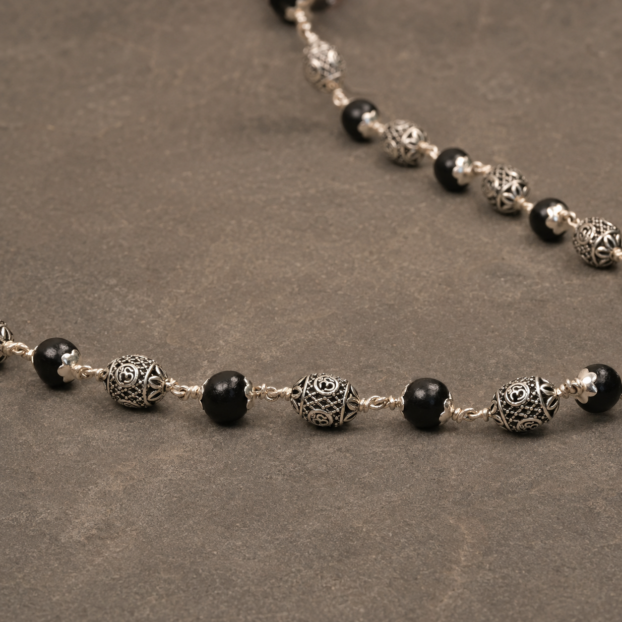 Karungali Oval Om Beads Mala in 925 Silver