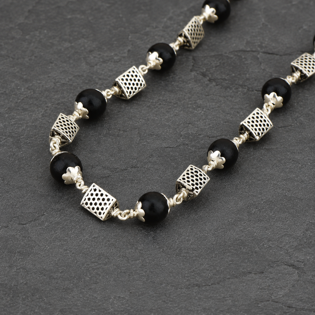 Karungali Mala with 925 Silver Triangle Beads