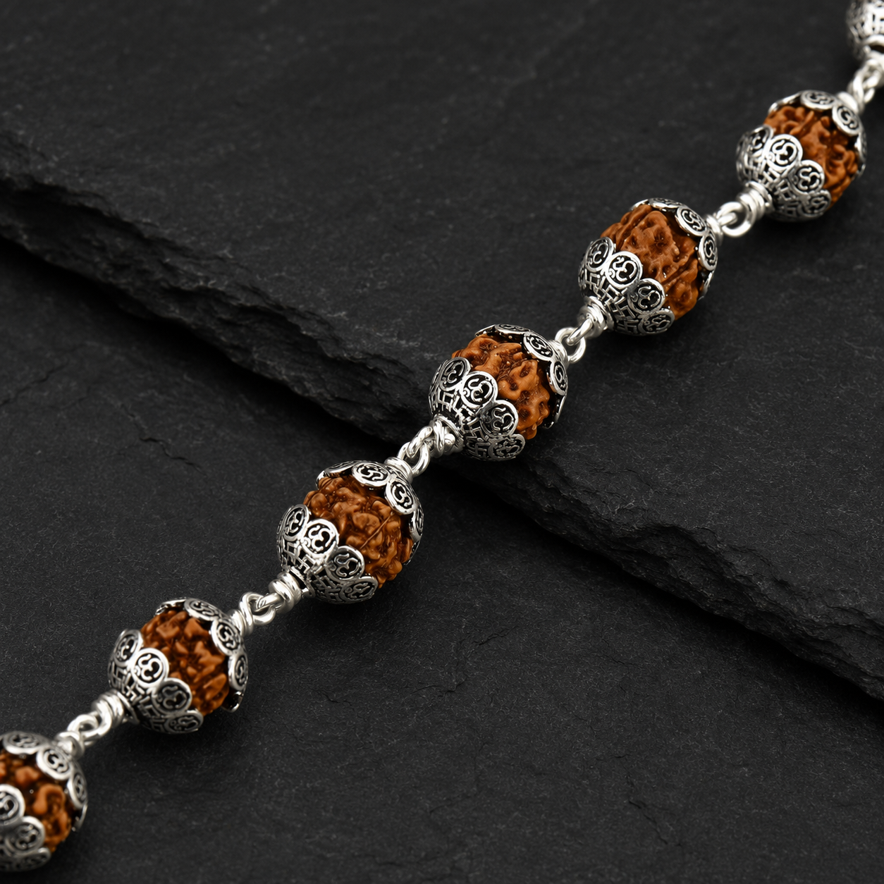 Rudraksha Bracelet with Om 925 Silver Caps – 9–10 mm