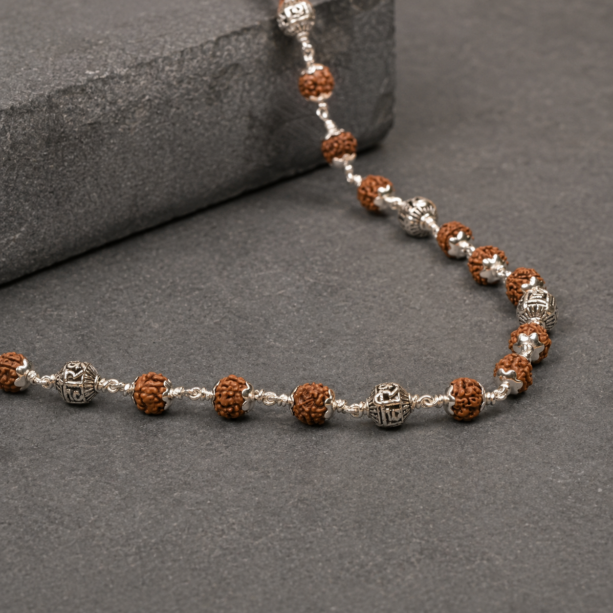 Natural 5 Mukhi Rudraksha and Shree Hari bead close-up