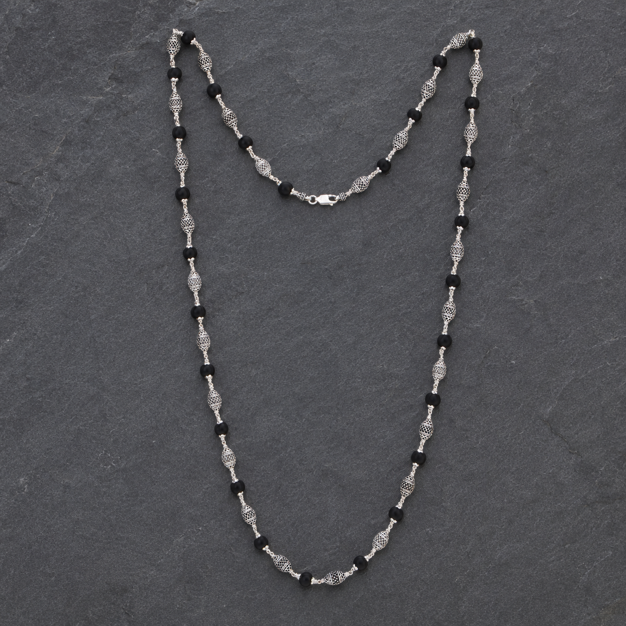 Premium dome bead Karungali Mala styled for meditation