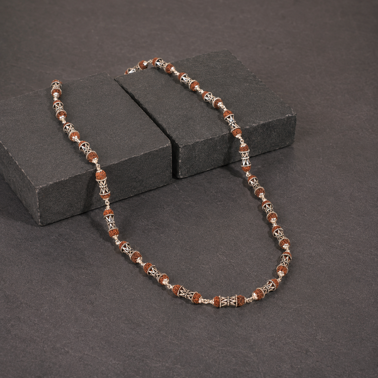 Rudraksha Mala with 925 silver Damru beads lifestyle view
