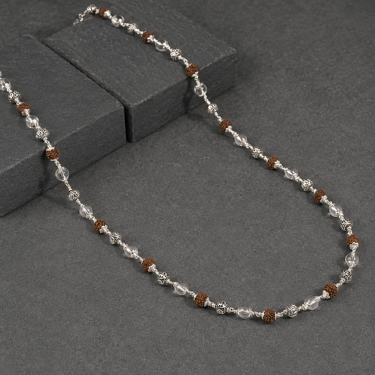 Rudraksha Sphatik and 925 silver Om bead close up