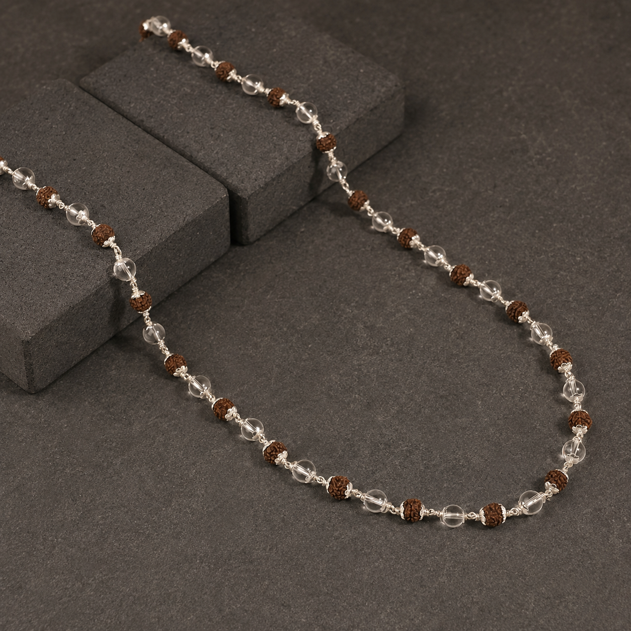 Rudraksha and clear Sphatik bead texture close-up